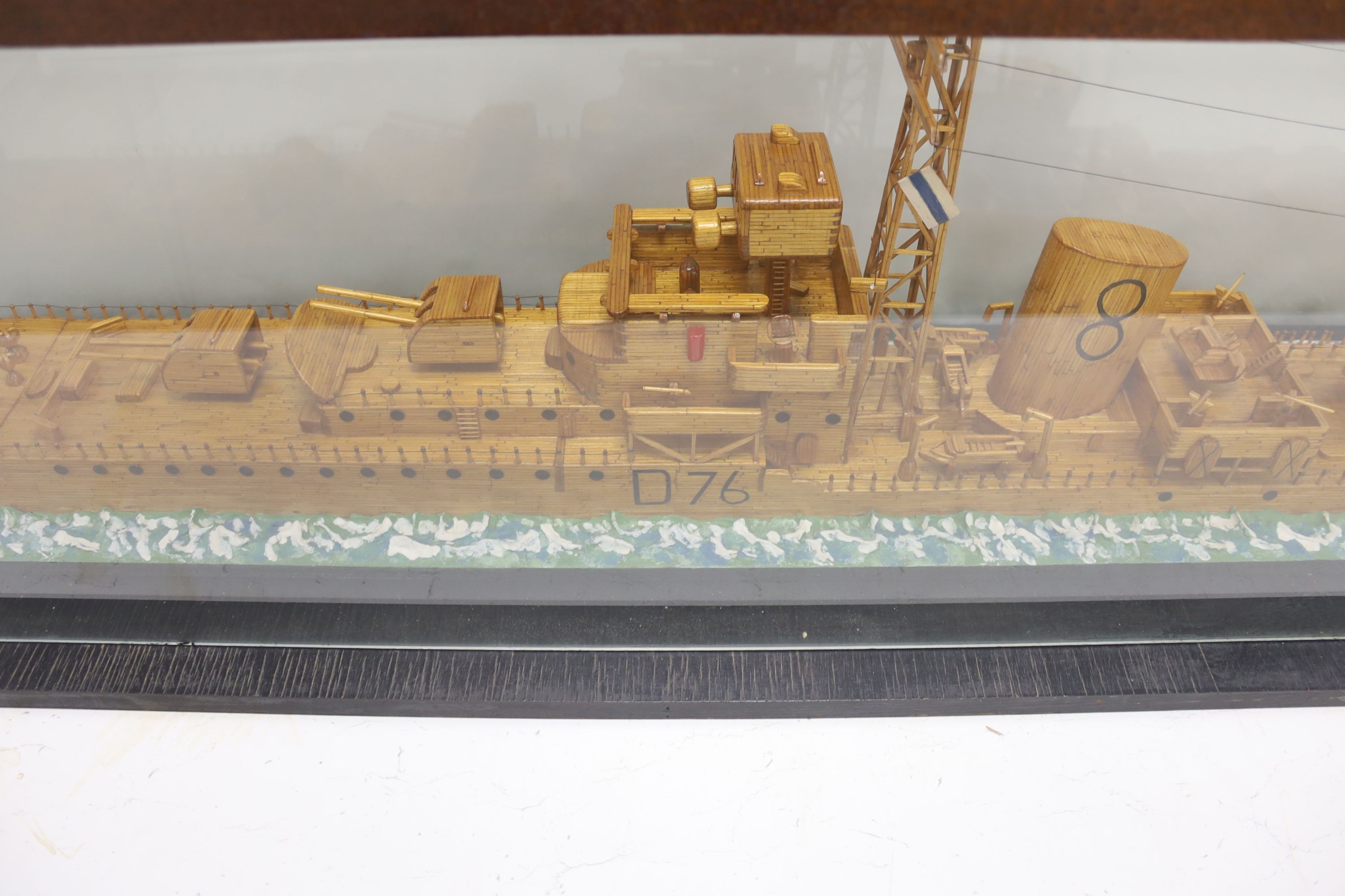 A large scratch built model of the destroyer HMS Consort (D76) made entirely out of matches, cased, 159cm total length